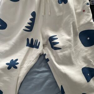 White Sweatpants with Blue Abstract Patterns
